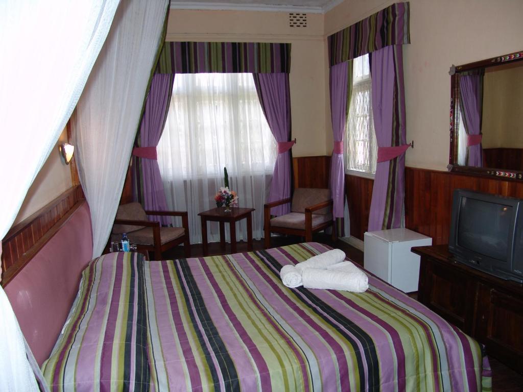 Sirona Getaway Hotel Найробі Номер фото