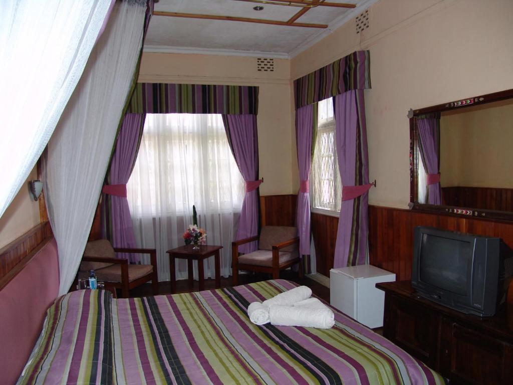 Sirona Getaway Hotel Найробі Номер фото